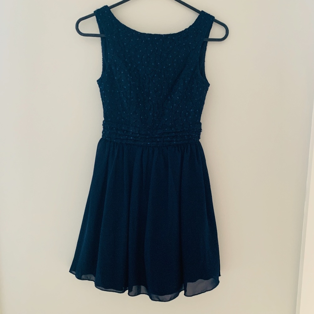 Short navy dress with lace